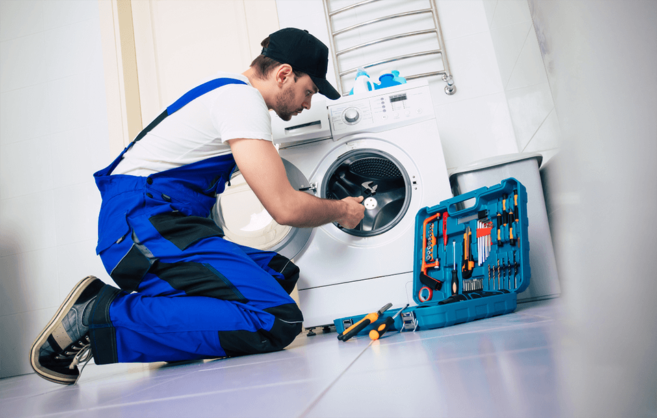 Professional washing machine repair technician